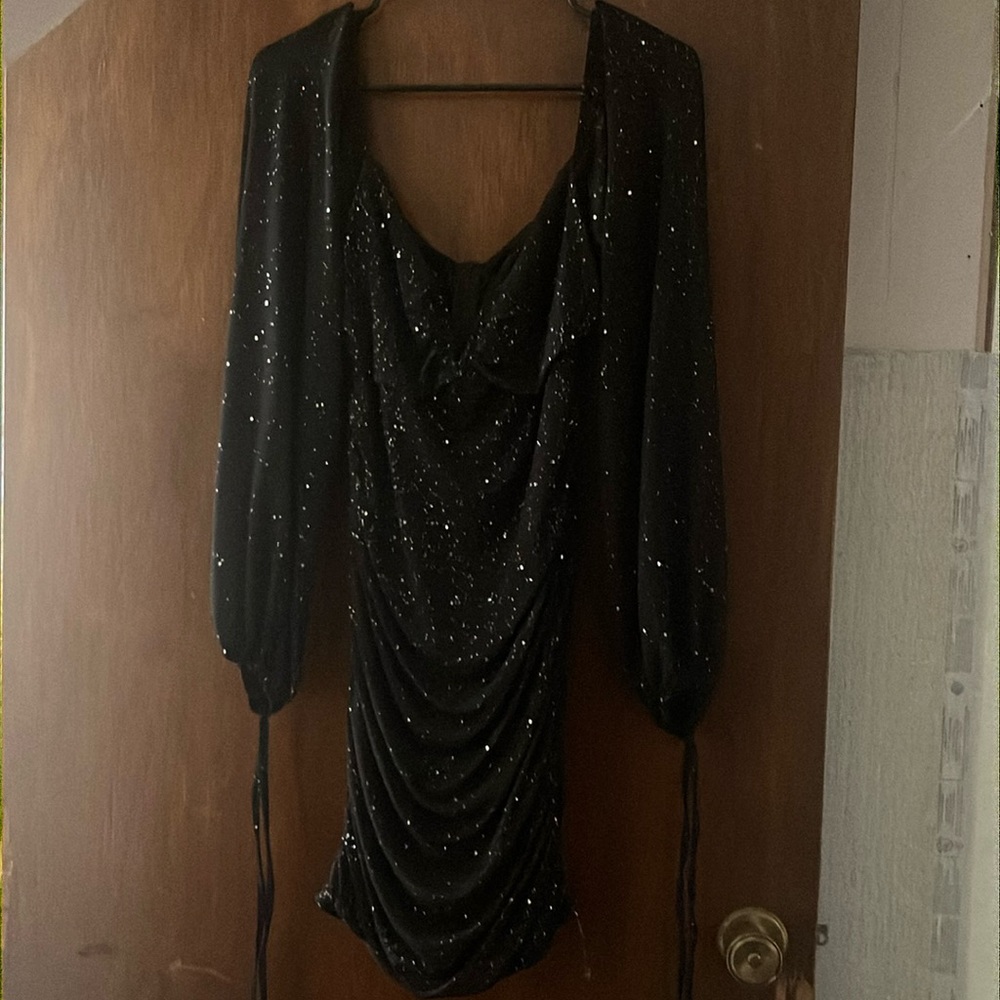 I am selling my black sparkly Homecoming as I won’t wear it again.